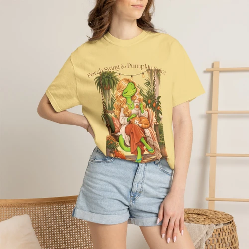 Close-up of the cozy porch swing and pumpkin-spice, warm autumn art graphic print on the Porch Swings & Pumpkin Spice t-shirt, butter