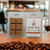 Hava Java House Blend wax melt clamshell on café counter with coffee beans in front