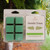 "Gentle Trees Wax Melt by Candles by Christie – six green wax cubes in clamshell packaging with label featuring cedar, applewood, and forest foliage notes."