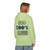Pistachio hoodie with large back print of the Coo Coo’s Coffee logo featuring blue paw-print style lettering. Female Model