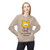 Sand sweatshirt featuring a wide-eyed cartoon cat with the phrase “My Last Nerve Just Quit” in bold black font. Female Model