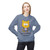 Stone Blue sweatshirt featuring a wide-eyed cartoon cat with the phrase “My Last Nerve Just Quit” in bold black font. Female Model