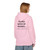 Light Pink-colored fleece hoodie with the phrase “#Small Batch of Friends… Coffee is compiling…” printed across the back. Female Model