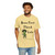 cream tee with frazzled green gecko (Bert) holding coffee cup and text “Brew First Think Later” – funny coffee shirt by Coo Coo’s Coffee