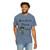 cream tee with frazzled green gecko (Bert) holding coffee cup and text “Brew First Think Later” – funny coffee shirt by Coo Coo’s Coffee