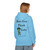 light gray hoodie with frazzled green gecko holding a coffee cup and the text “Brew First, Think Later – Fueled by Coo Coo’s Coffee”
