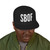 black snapback hat with bold white SBOF embroidery – minimalist small batch streetwear cap by Coo Coo’s Coffee