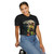 Person wearing the Brew-Witch ‘Basic Witch’ black coffee t-shirt from Coo Coo’s Coffee, female model sitting