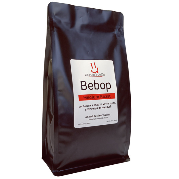 bold, rhythmic medium roast with smooth chocolate and a hint of smoke; 12oz small-batch specialty by Coo Coo’s Coffee.