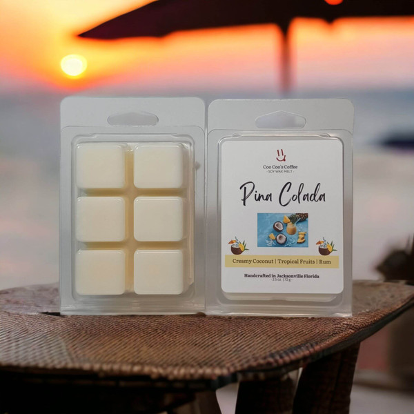 “Piña Colada Wax Melt pack on a patio table at sunset, tropical candle alternative by Candles by Christie with coconut cream and pineapple vibes.”