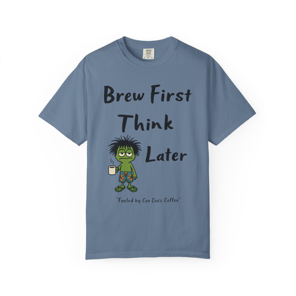 Brew First, Think Later – Bert’s Morning Motto Tee by Coo Coo’s Coffee in blue jean, relaxed-fit coffee lover’s t-shirt.