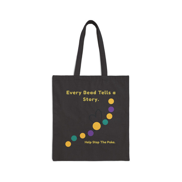 Black cotton tote bag with Every Bead Tells a Story bravery bead design, front view