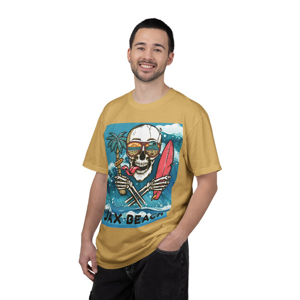 Model wearing Jax Beach Surf Skull graphic tee in mustard by Coo Coo’s Coffee
