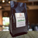 Dawn till Dusk, medium dark
roast ​decaffeinated coffee, coffee shop background