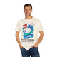 Ivory Comfort Colors t-shirt with a cartoon chicken surfing and shouting “Cluck Yeah!” with the words “Poultry-Powered, Coffee-Fueled.” Male Model