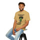 sand-colored tee with frazzled cartoon gecko holding coffee cup and the text “He Practiced 40 Hours… But Forgot to Brew”