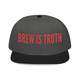 black/grey snapback hat with red “brew is truth” embroidery and purple brim – coo coo’s coffee bold cap