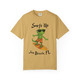 Mustard yellow short-sleeve tee with Bert the gecko in sunglasses surfing, “Surfs Up – Jax Beach, FL” text, Bert’s Surf Club – Jax Beach Tee by Coo Coo’s Coffee.