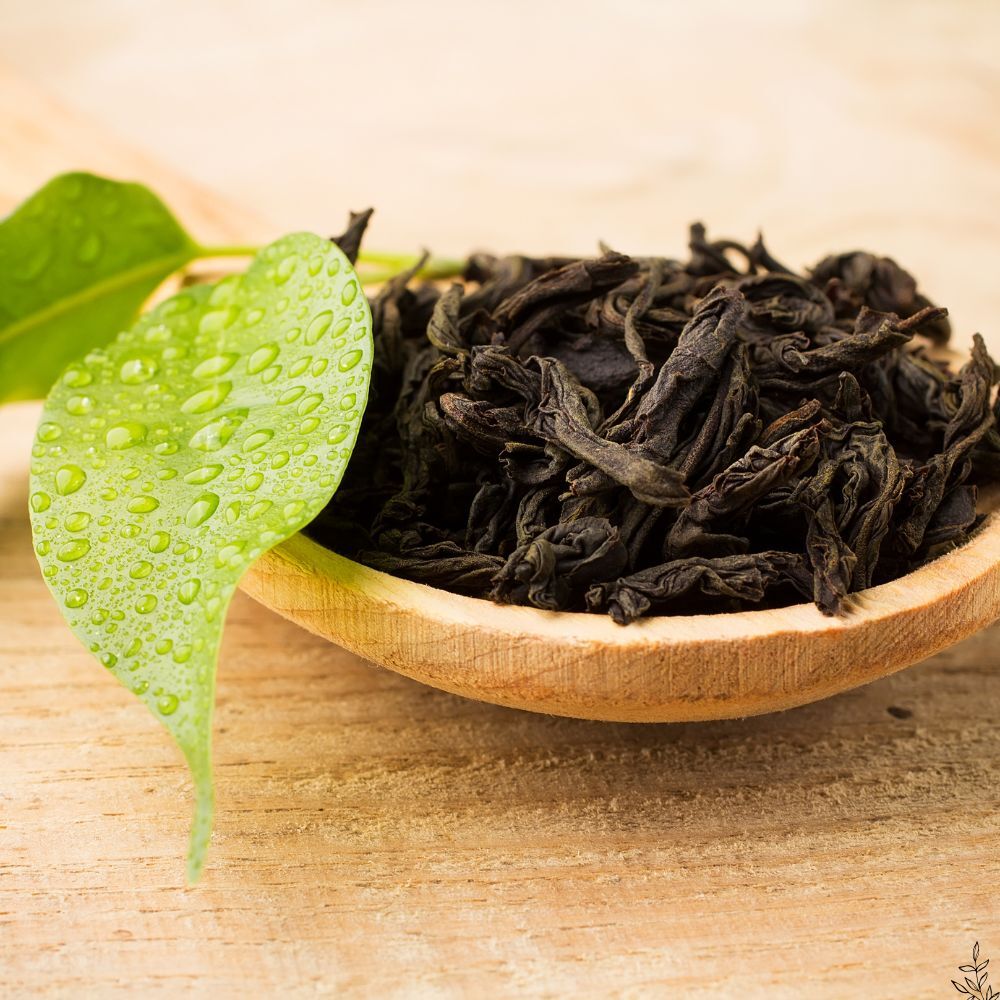 Black tea leaves and a brewed cup (placeholder image)