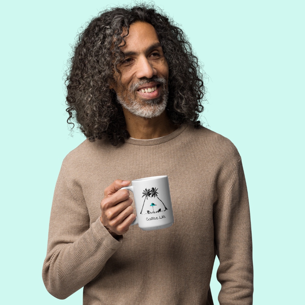 Male model holding Coffee Life, coffee mug.