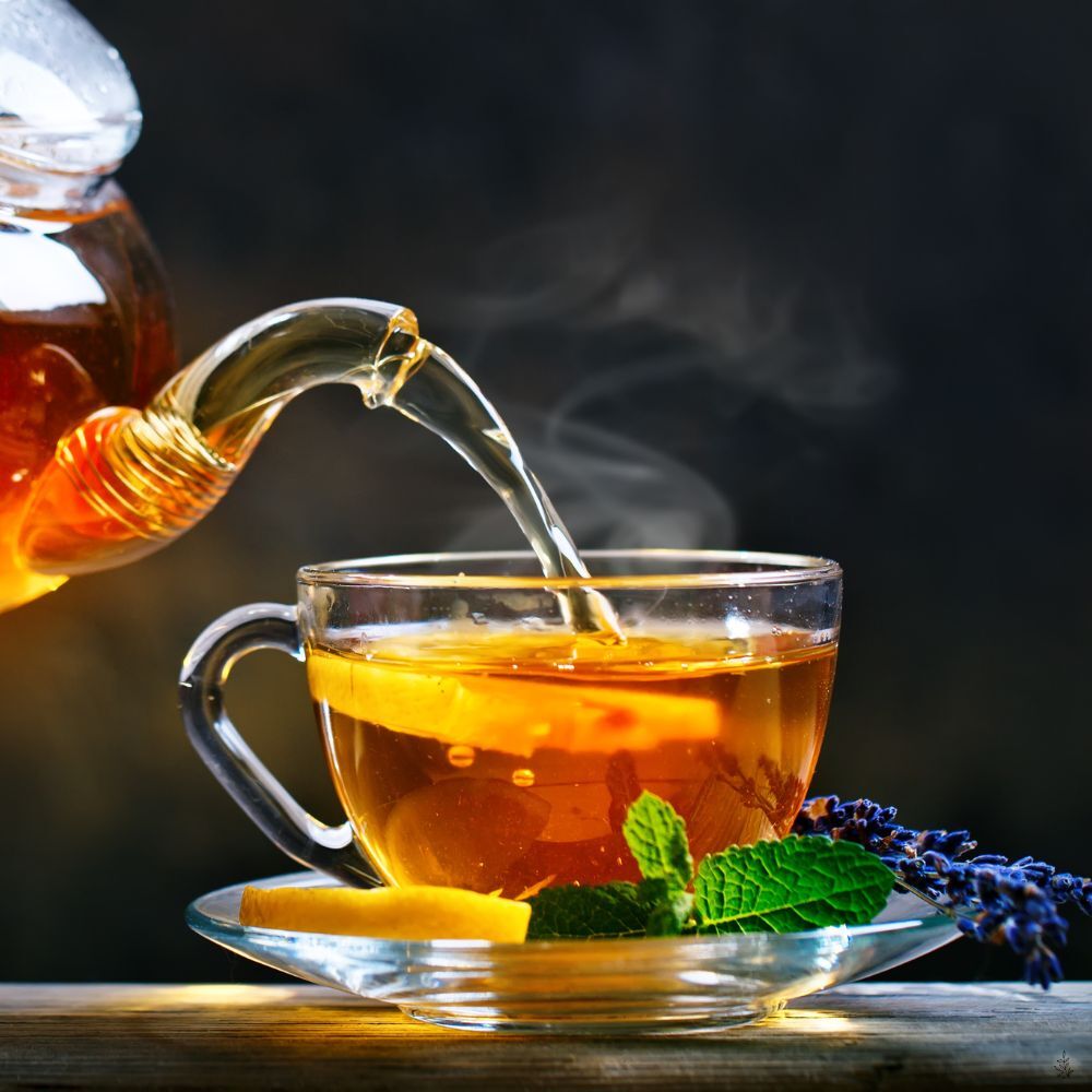 Hot tea being poured (placeholder image)
