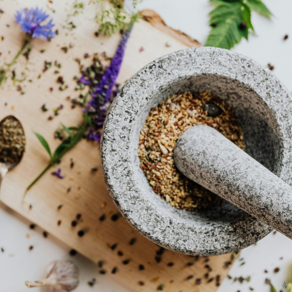 Mortar and pestle with chai spices (placeholder image)