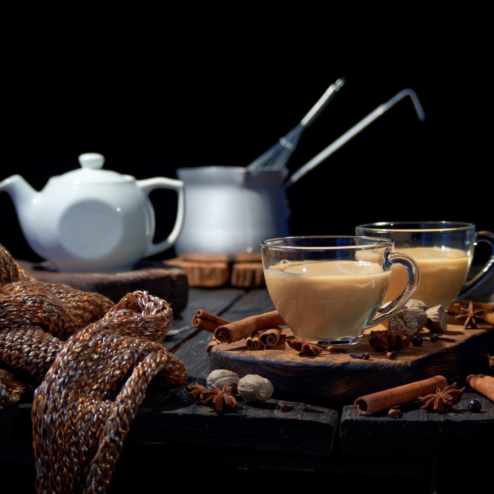 Different chai drinks on a tray (placeholder image)
