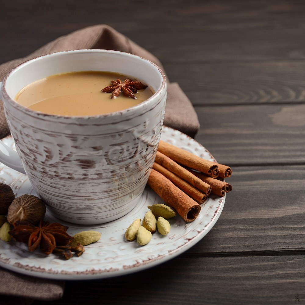 Chai being sweetened and topped with milk (placeholder image)
