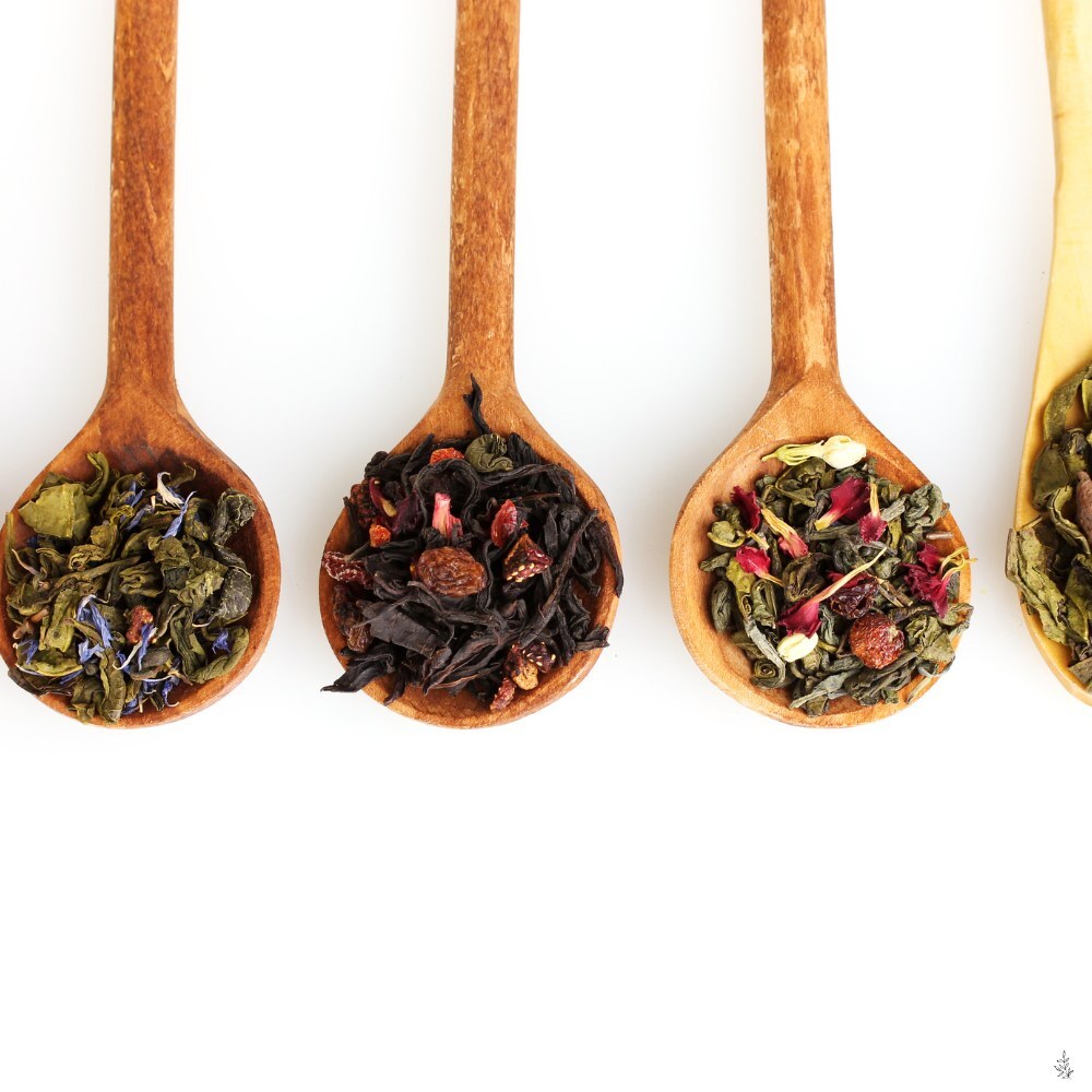White tea leaves in a scoop (placeholder image)