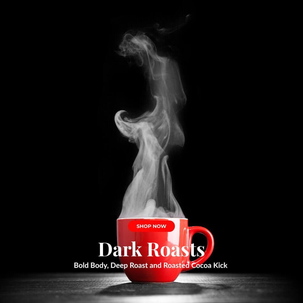 Steaming red coffee mug on dark background symbolizing bold, full-bodied dark roast coffee from Coo Coo’s Coffee