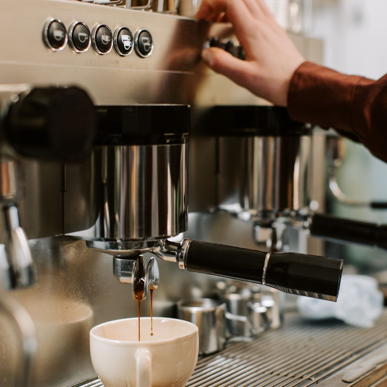 Barista pulling a rich espresso shot
