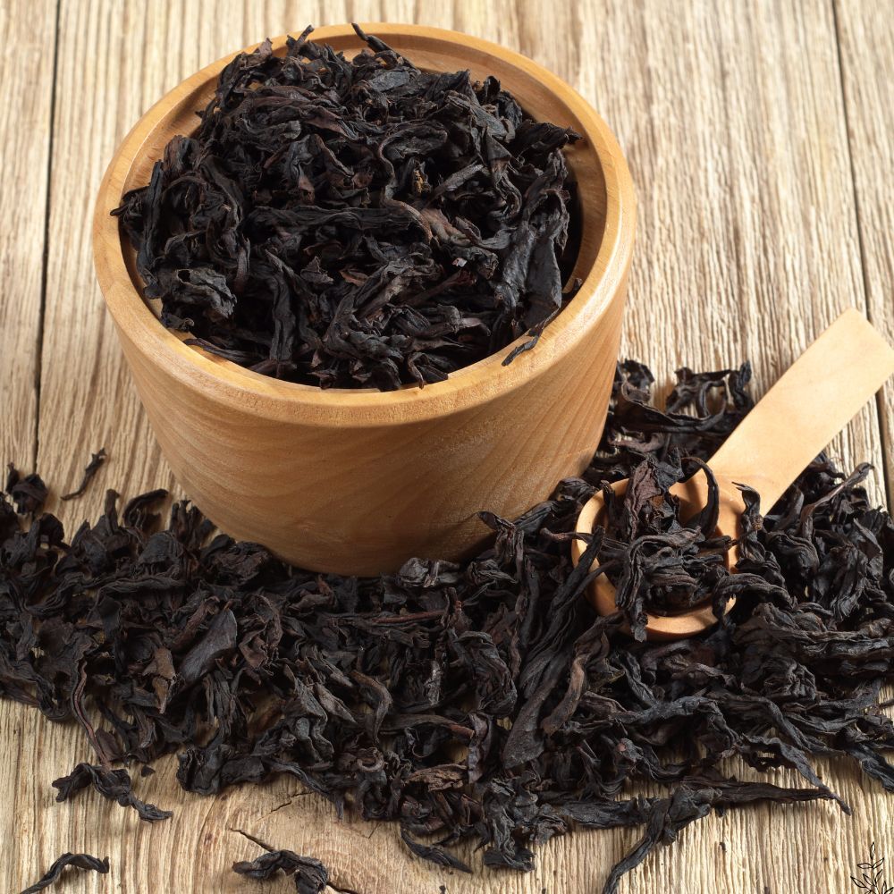 Oolong tea leaves and brewed oolong tea