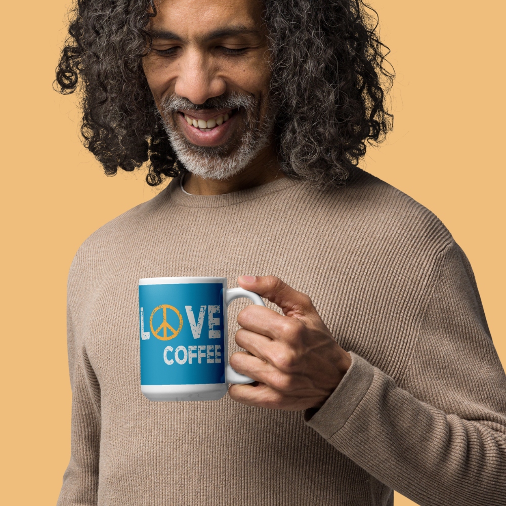 Peace Love Coffee, blue ceramic coffee mug male model drinking coffee