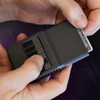 ACM®3.0 Stealth with hands demonstrating card retrieval