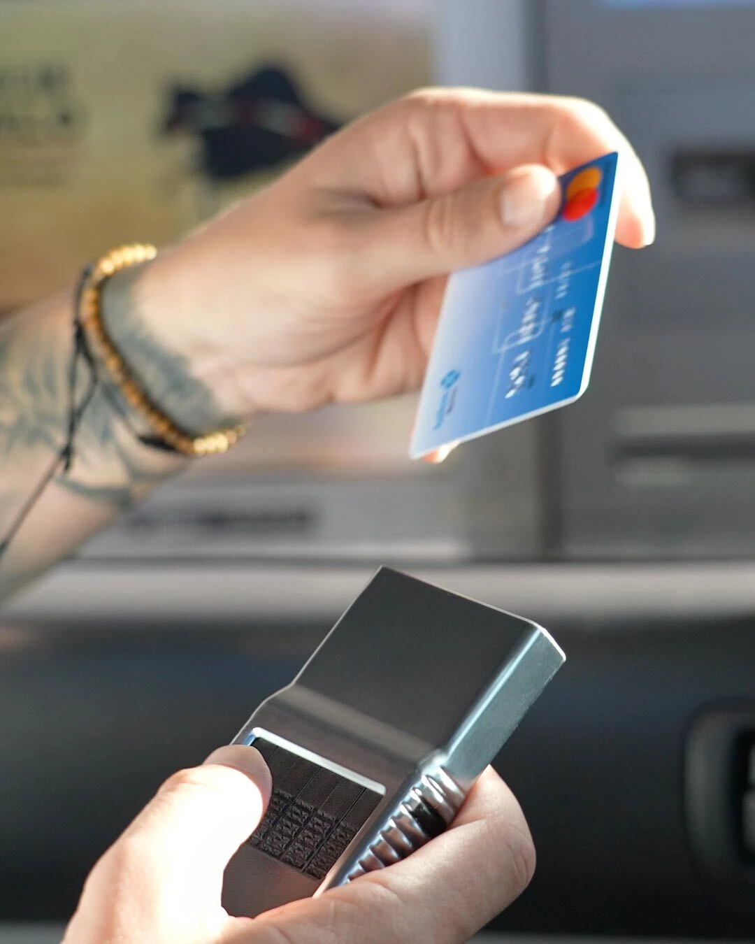 ProTek held securely in hand with its six card selectors accessible