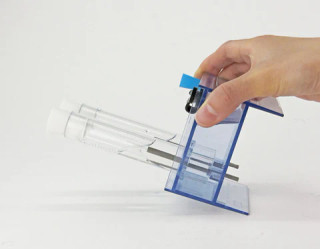 Electrolysis Apparatus with a Closed Design for Added Safety and Enhanced Chemistry Experiments