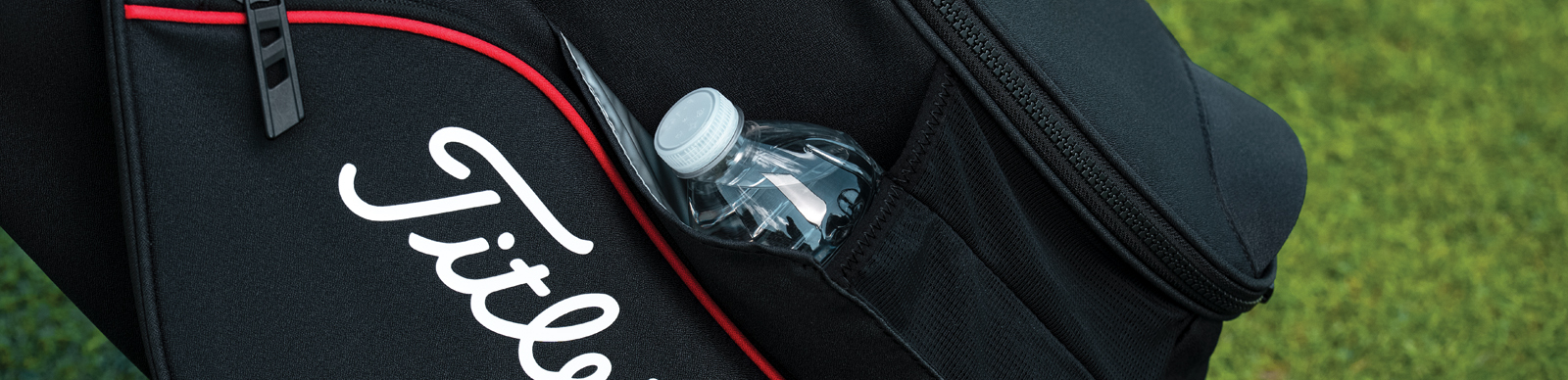a water bottle in a golf bag pocket - tips on how to organize a golf bag