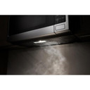 Maytag® Four à micro-ondes à hotte intégrée avec revêtement intérieur antiadhésif - 1.7 pi cu YMMMS4230PZ