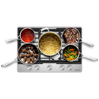 Kitchenaid® Table de cuisson au gaz à surface en métal avec 5 brûleurs polyvalents et des grilles en fonte continues KCGK330SSS