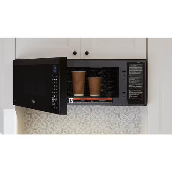 Whirlpool® Four à micro-ondes intelligent à hotte intégrée et profil bas de 1,1 pi cu avec ventilation de 450 pi³/min à 4 vitesses YWMML5530RV