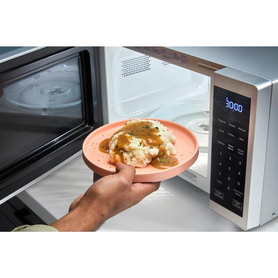 Whirlpool® Four à micro-ondes de comptoir avec nettoyage à la vapeur de 900 watts - 0.9 pi cu WMCS3019RS