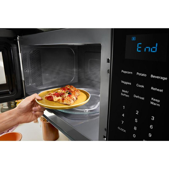 Whirlpool® Four à micro-ondes à hotte intégrée avec cuisson par détection - 1,9 pi cu - 1000 watts YWMMS3230SB
