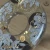 Shiro Yuri Transparent Bronze handcrafted Tsuba close up front