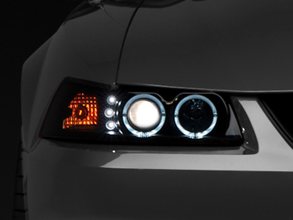 Raxiom 99-04 Ford Mustang Dual LED Halo Projector Headlights- Black Housing (Smoked Lens) - 49113