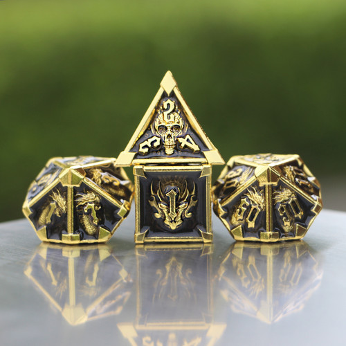 gold black metal dice set