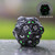 black d20 dice glow green eyes dice