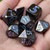 black blue metal dice set