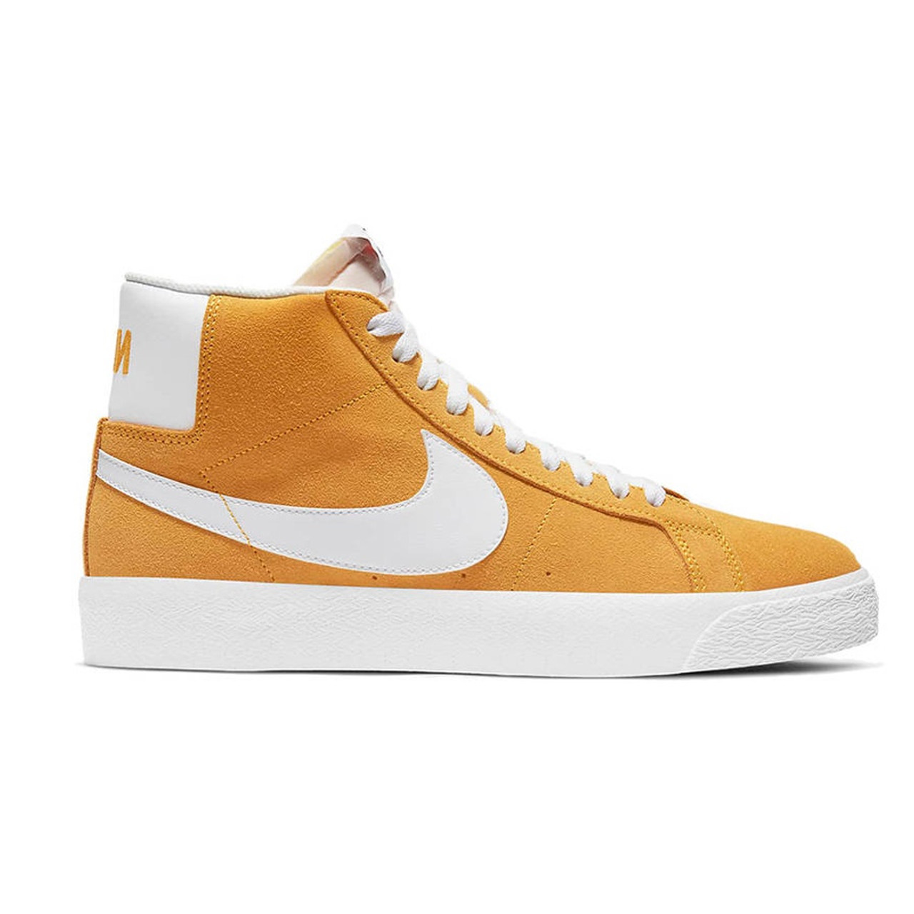 nike gold white shoes