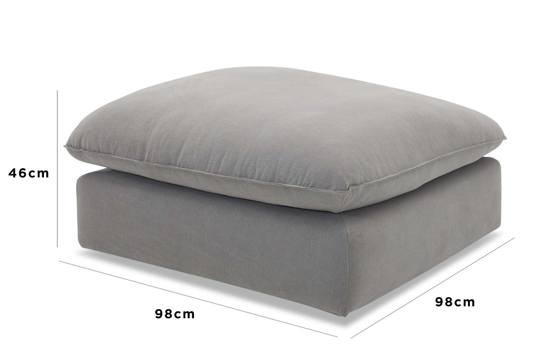 a white bed with a white cover