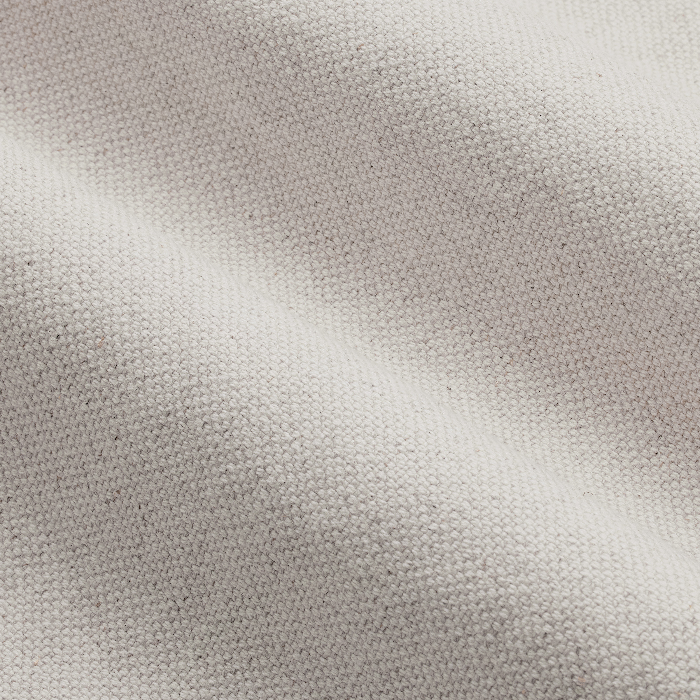 a white surface with a dark background